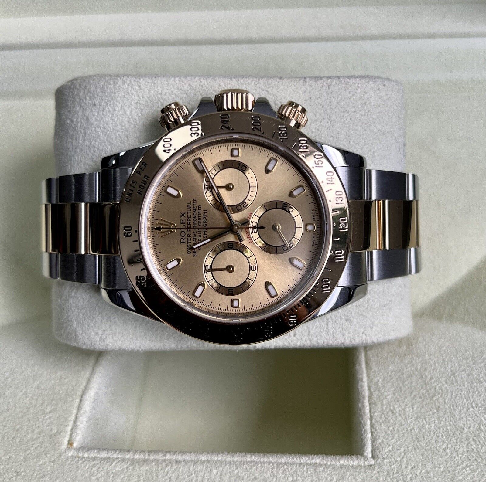 Champagne daytona best sale watch price